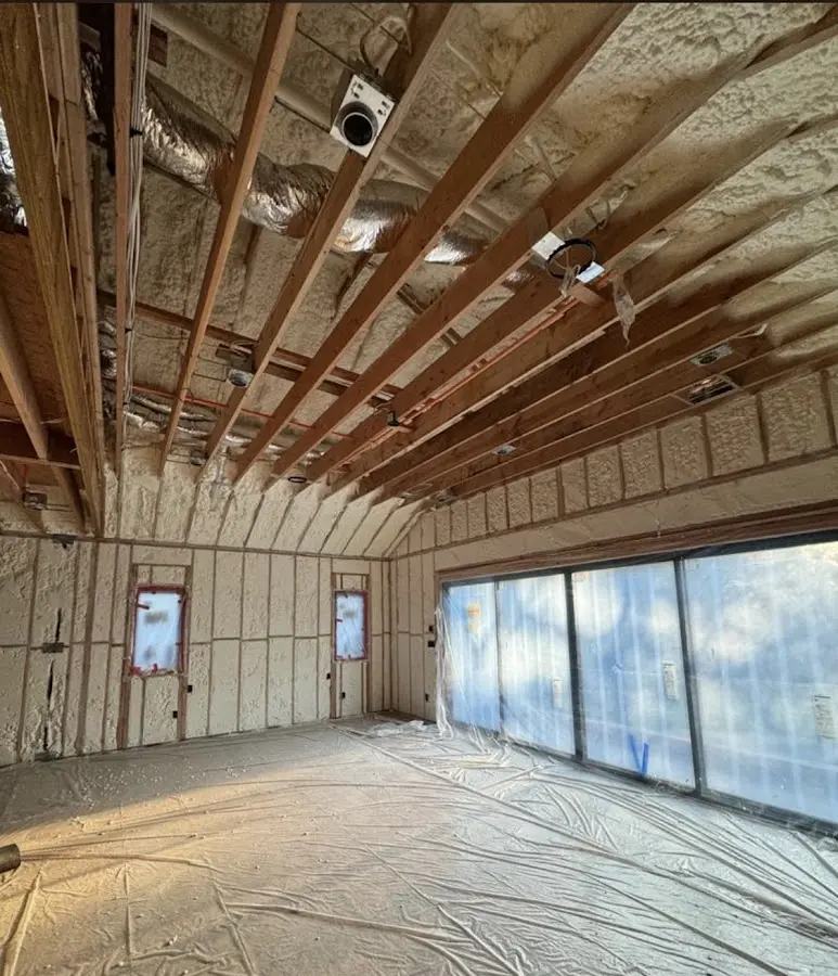 Interior walls and ceiling insulated with spray foam during new construction in Fishkill